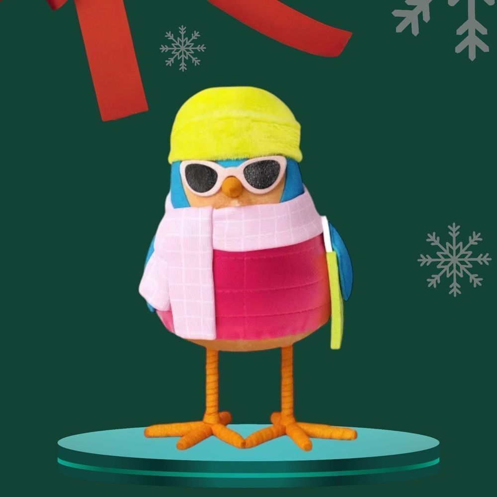 BLUE BIRD WITH PUFFER JACKET AND SUNGLASSES